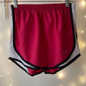 Dark pink Nike athletic shorts
